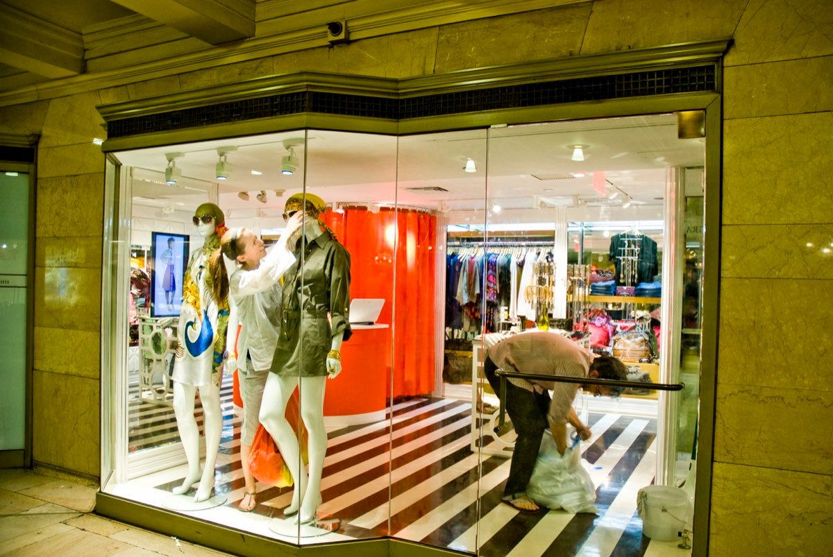 A specialty retail store built inside a major transit destination, with product displays and seating.